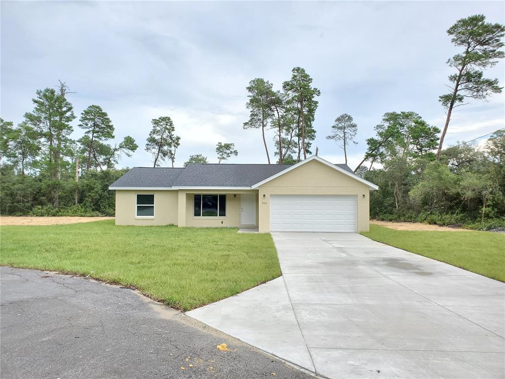 front view of a house with a yard