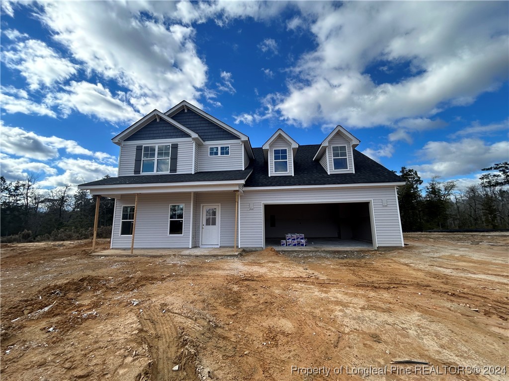 a front view of a house with yard