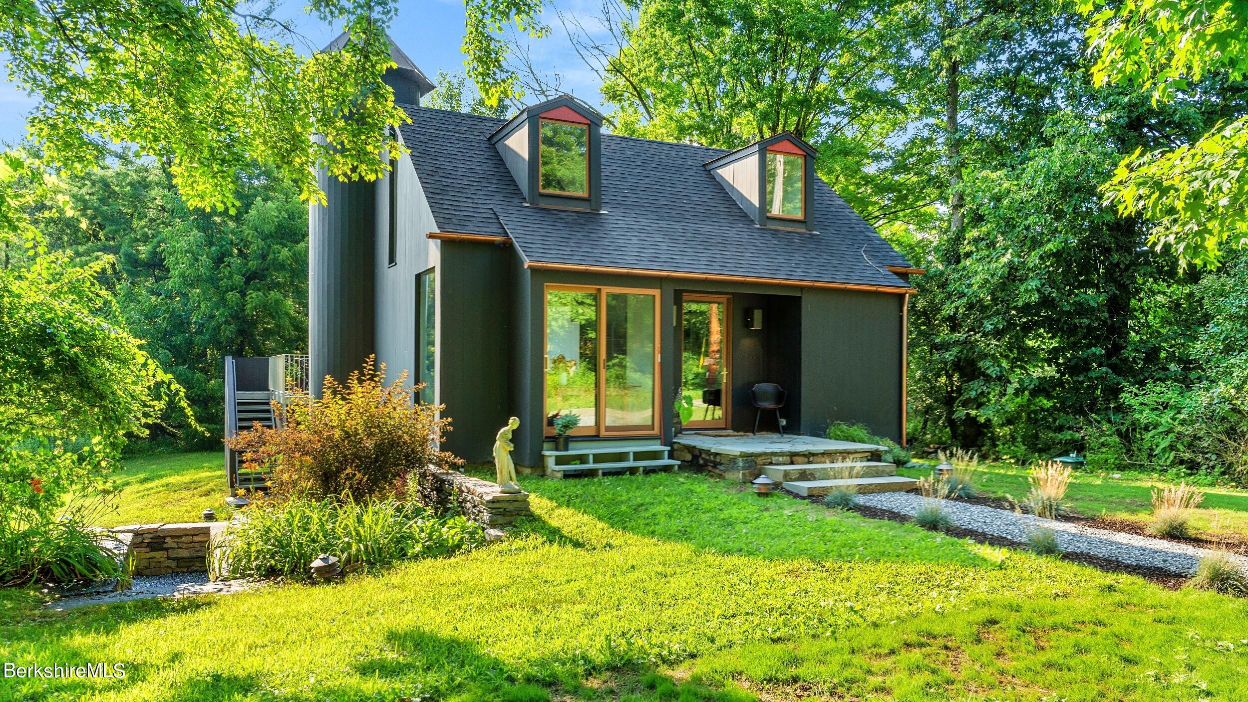 a house view with a garden space