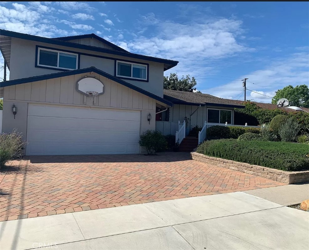 a front view of house with a yard