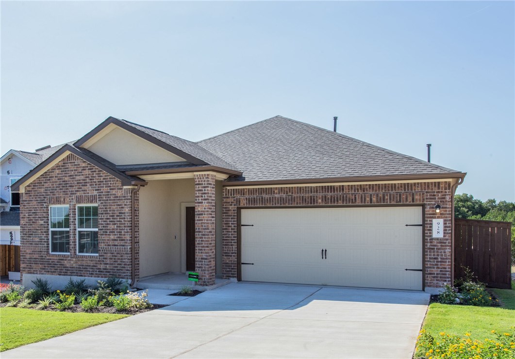 a front view of house with yard