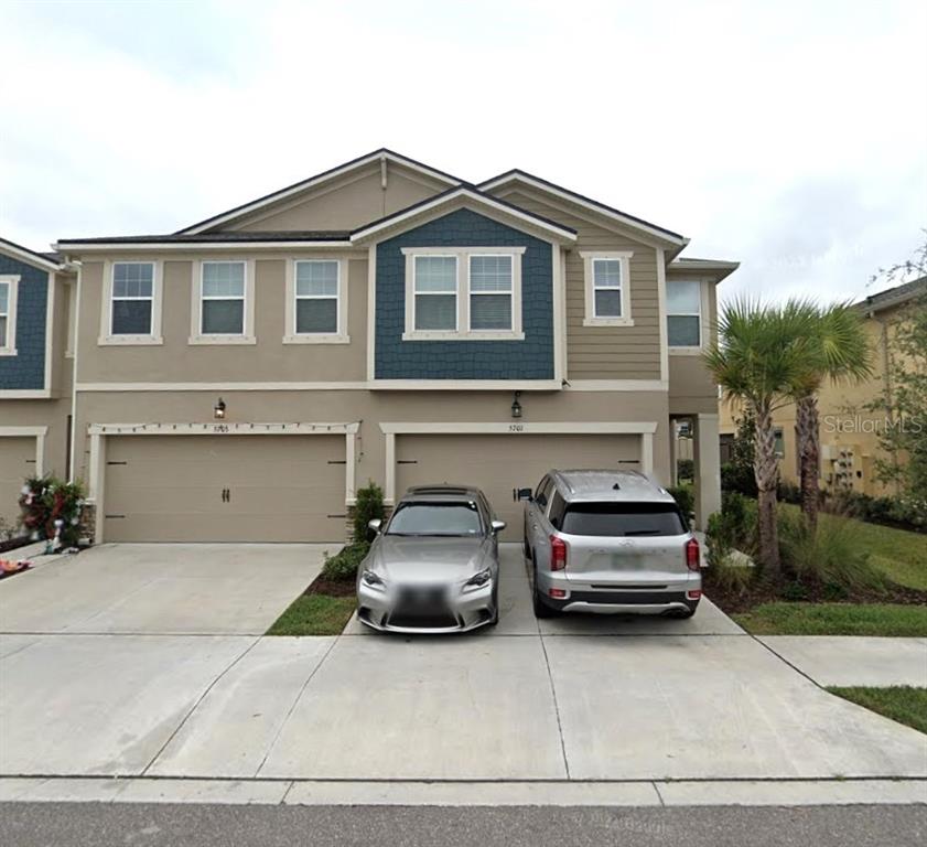 a car parked in front of a house