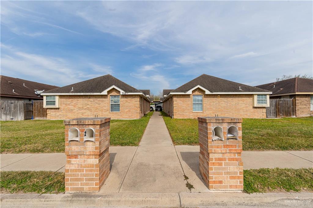 front view of house with a yard