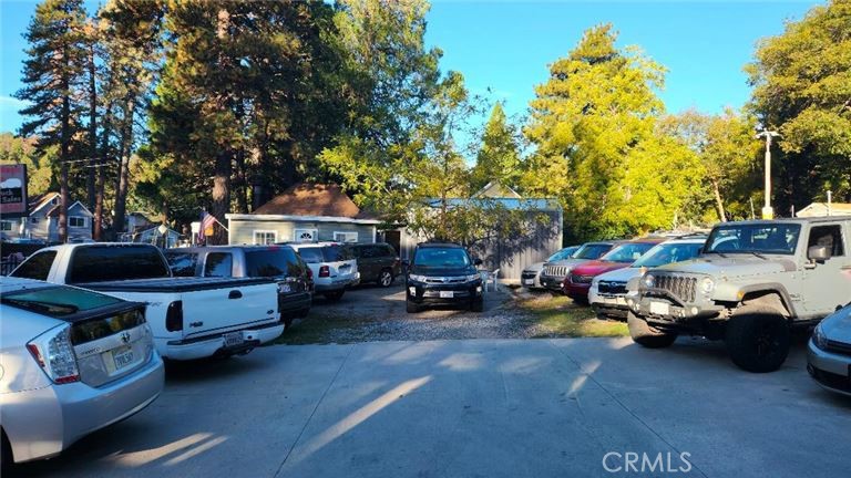 a view of cars parked in a parking lot