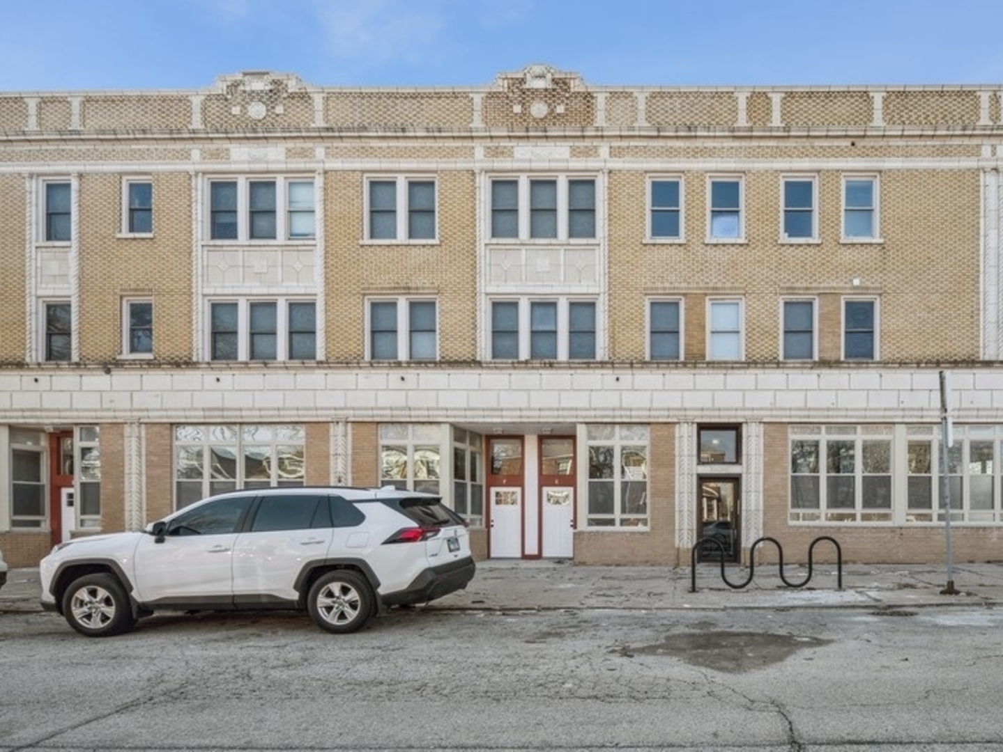 a car parked in front of a building