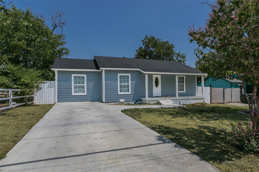 front view of a house and a yard