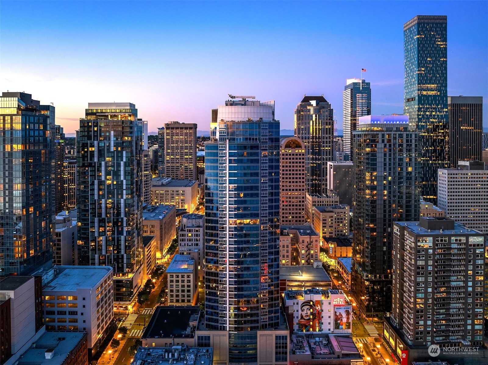 a view of a city with tall buildings