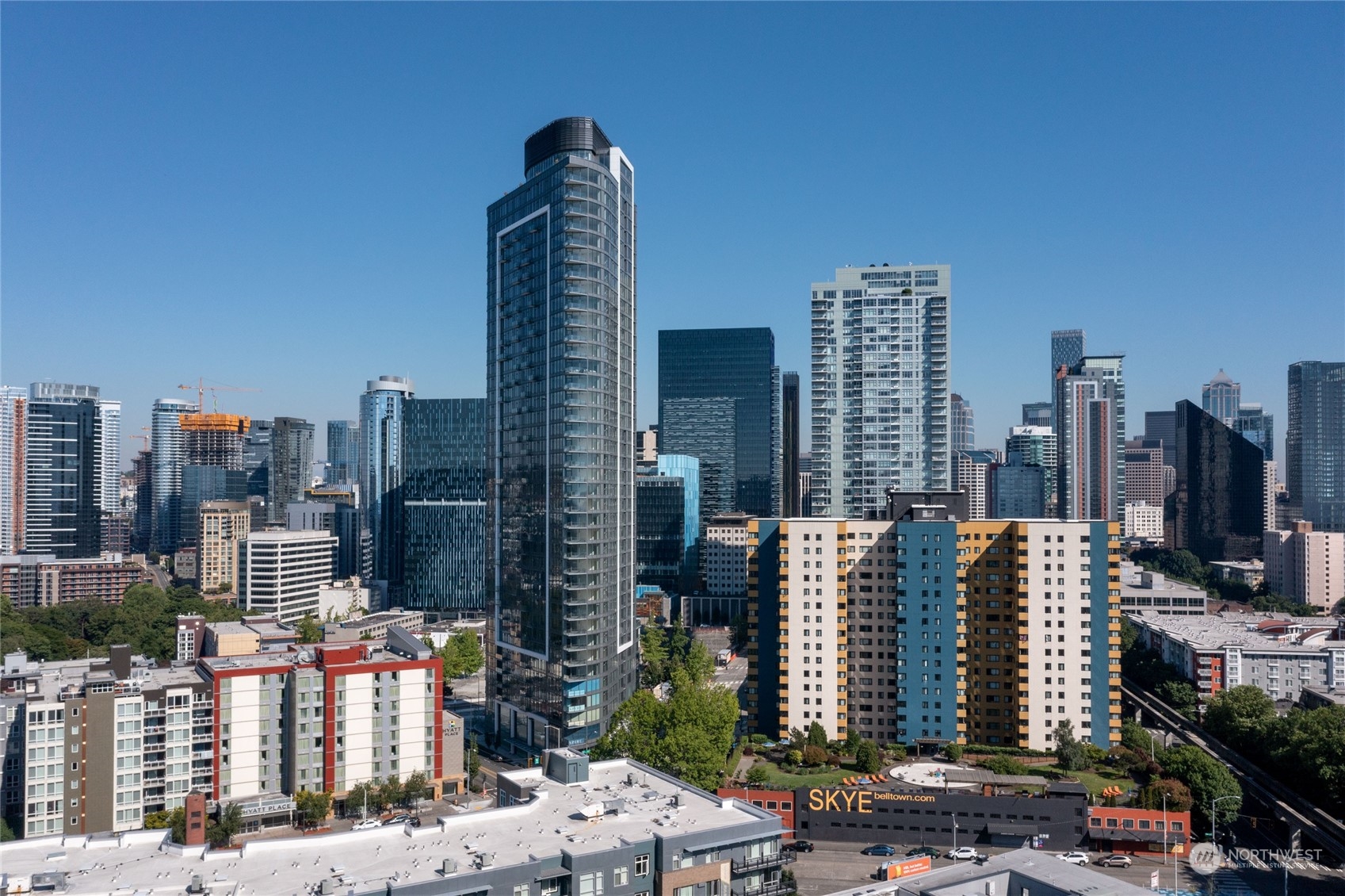 a view of city with tall buildings