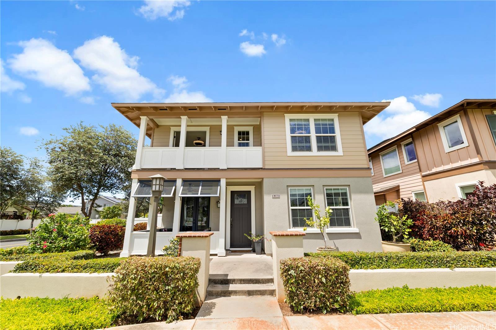 front view of a house with a yard