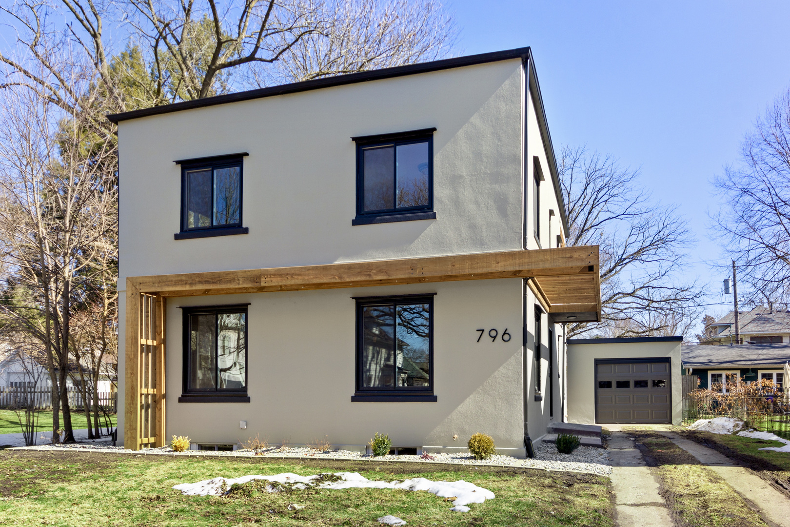 front view of a house with a yard