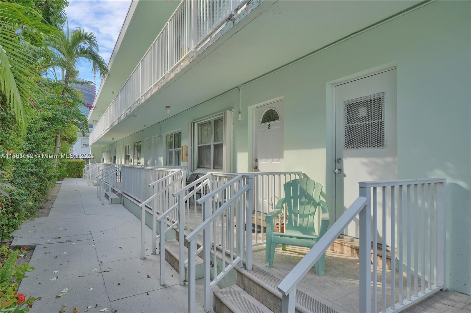 a view of balcony with furniture