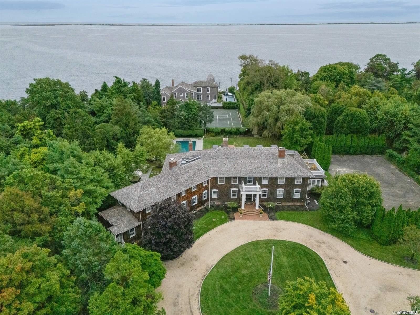 an aerial view of a house with a garden and plants