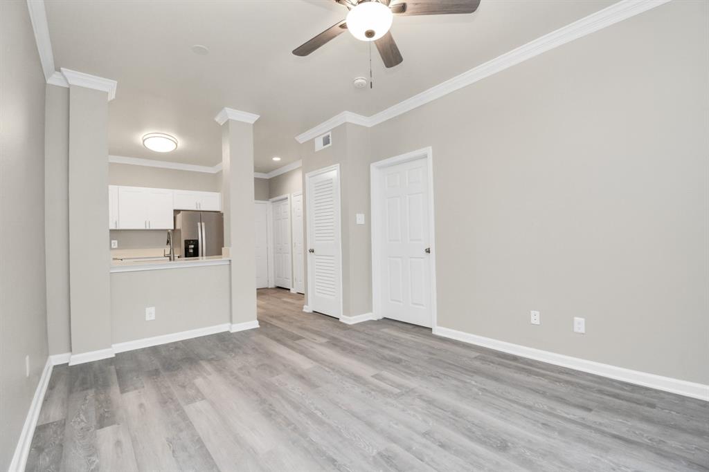 a view of a kitchen with an empty space and a kitchen view