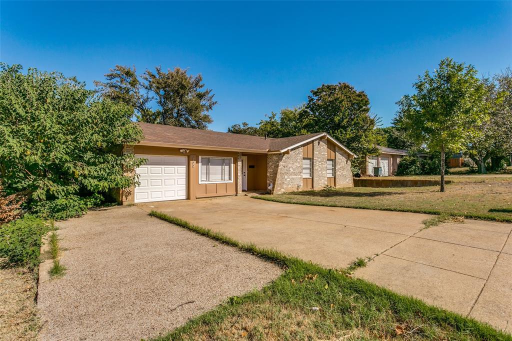 a house with trees in the background