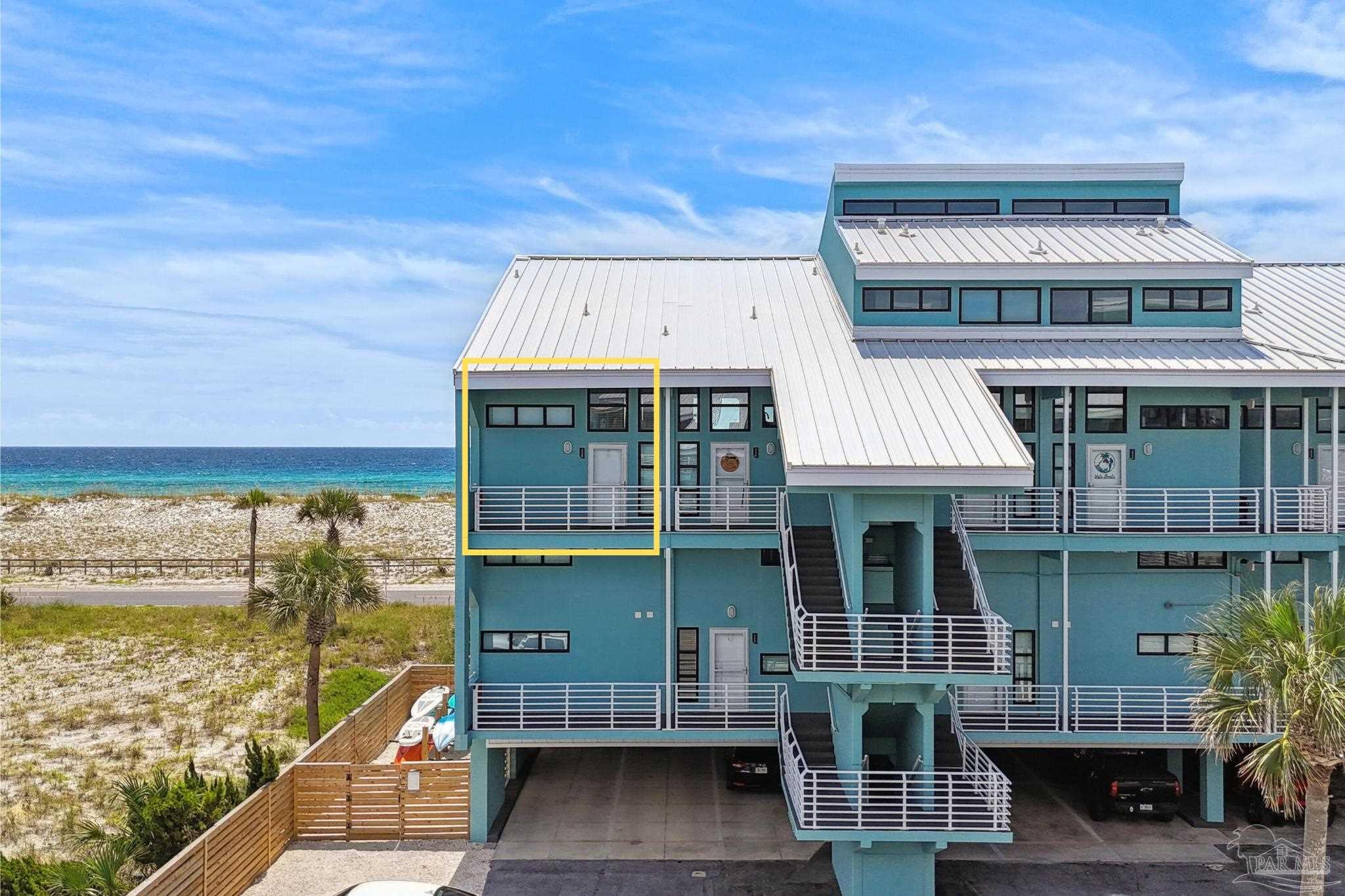 a view of a house with a ocean view