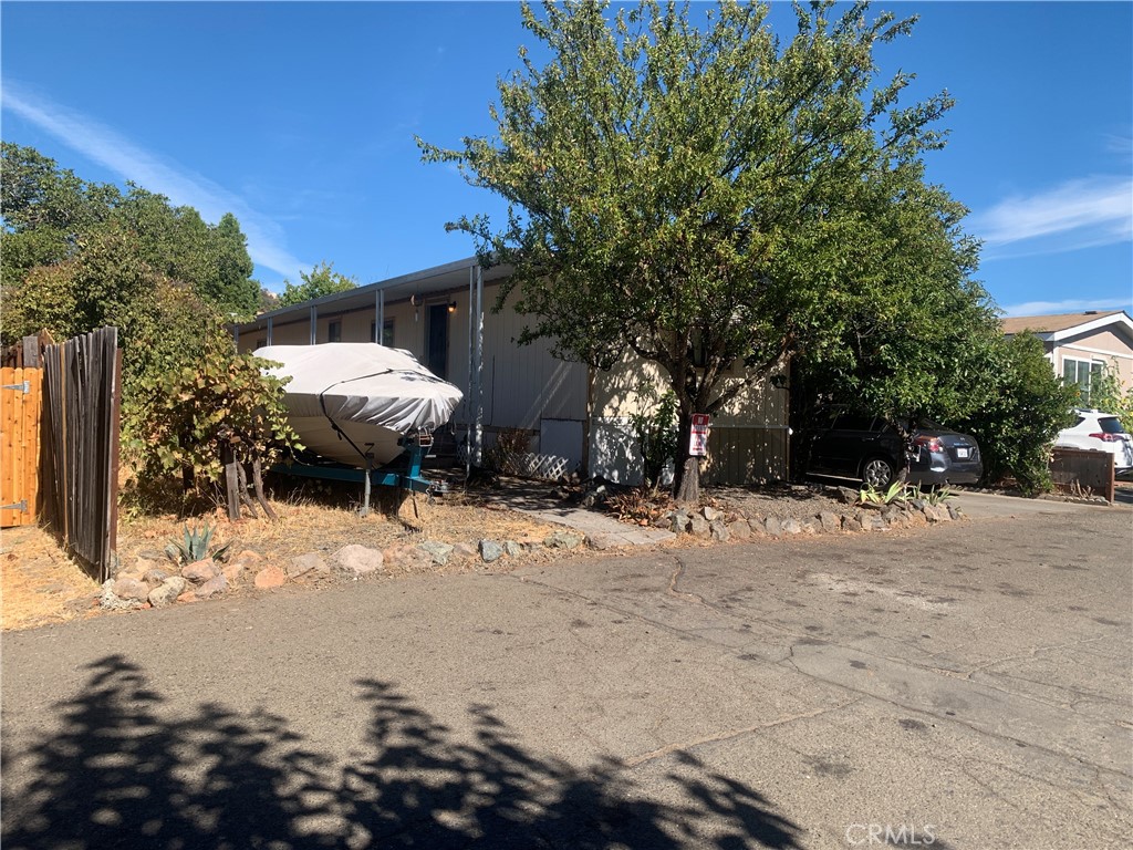 a view of a backyard of a house