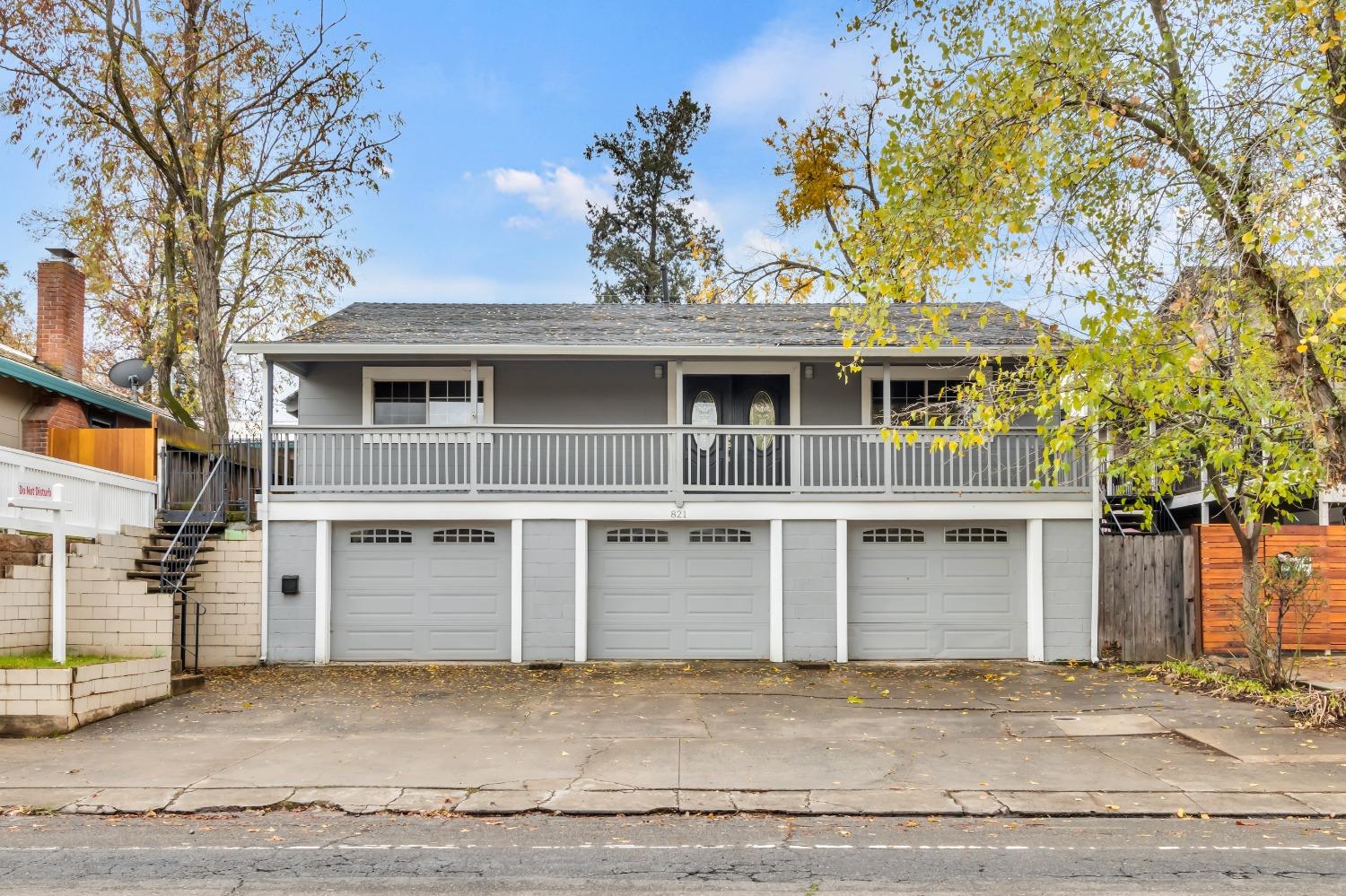 a front view of a house with a garage