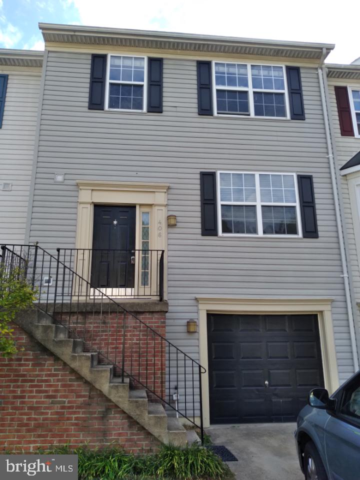 a front view of a house with yard