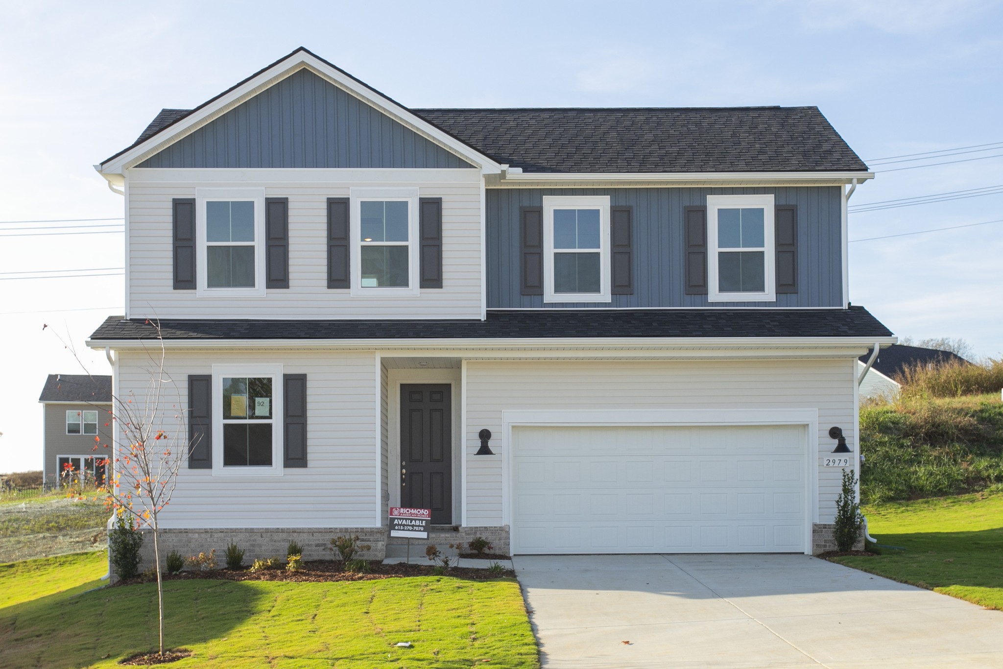 a front view of house with yard