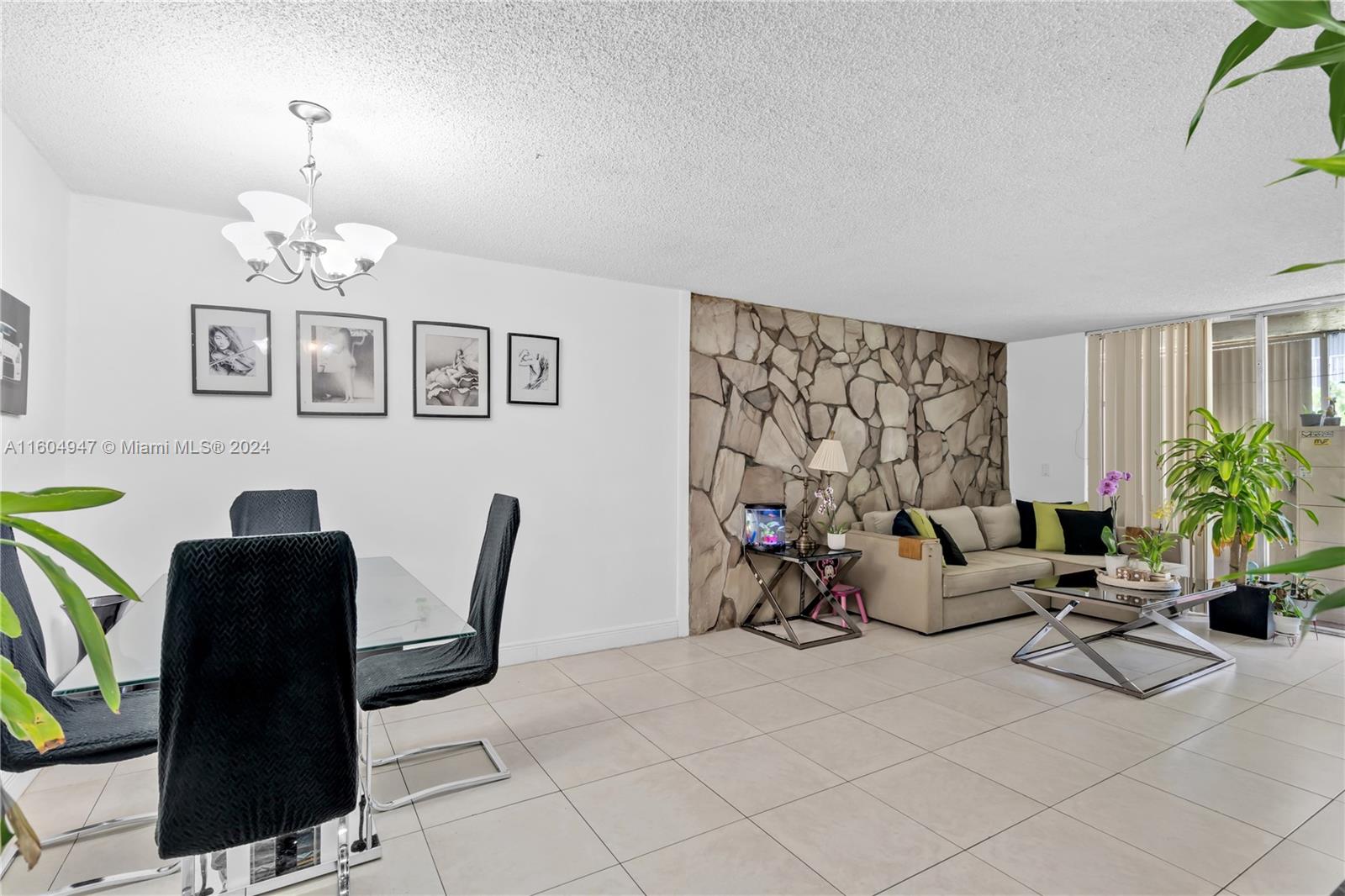 a view of a livingroom with furniture and a couch