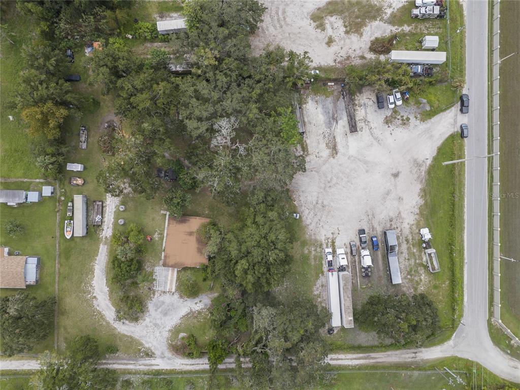 an aerial view of residential house with outdoor space