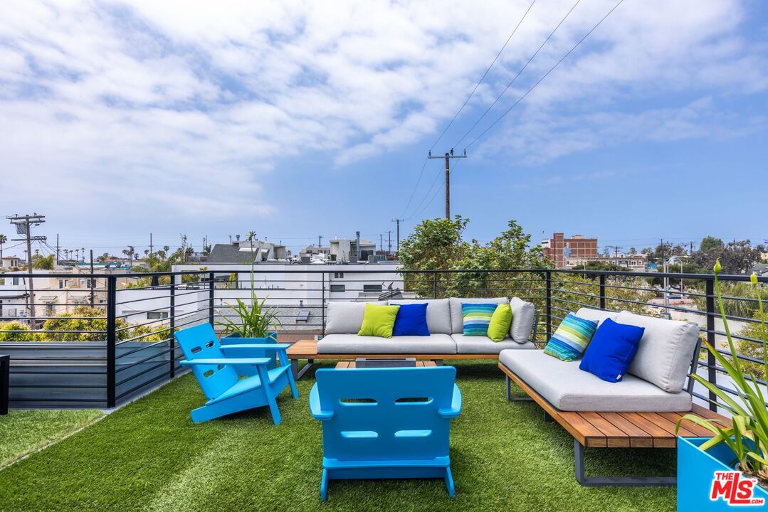 a view of a chairs in patio of the house