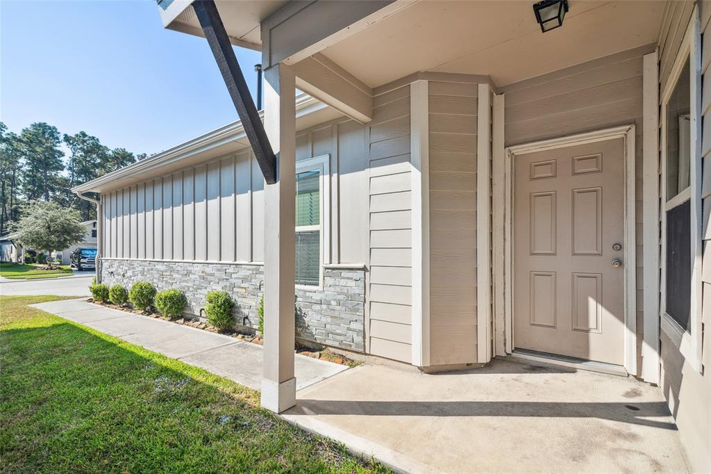 a view of a porch with a backyard