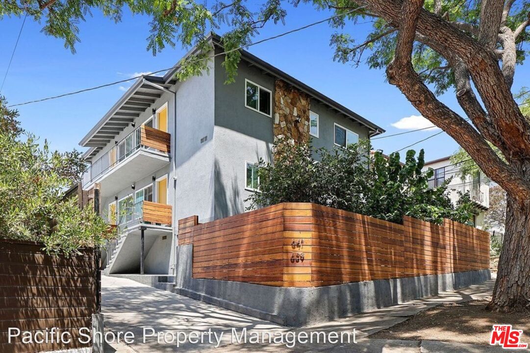 a blue building view with outdoor space