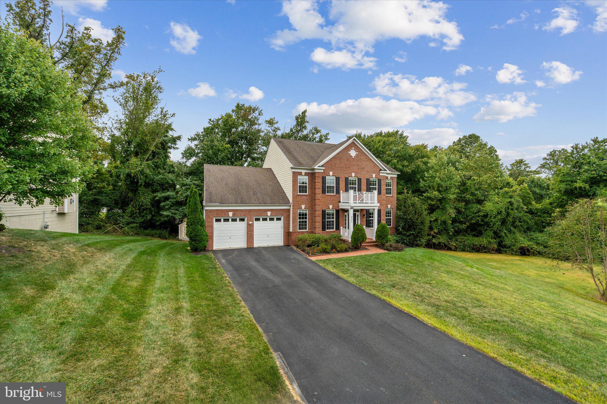 a view of a house with a big yard