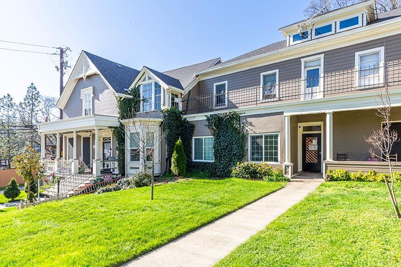 front view of a house with a yard