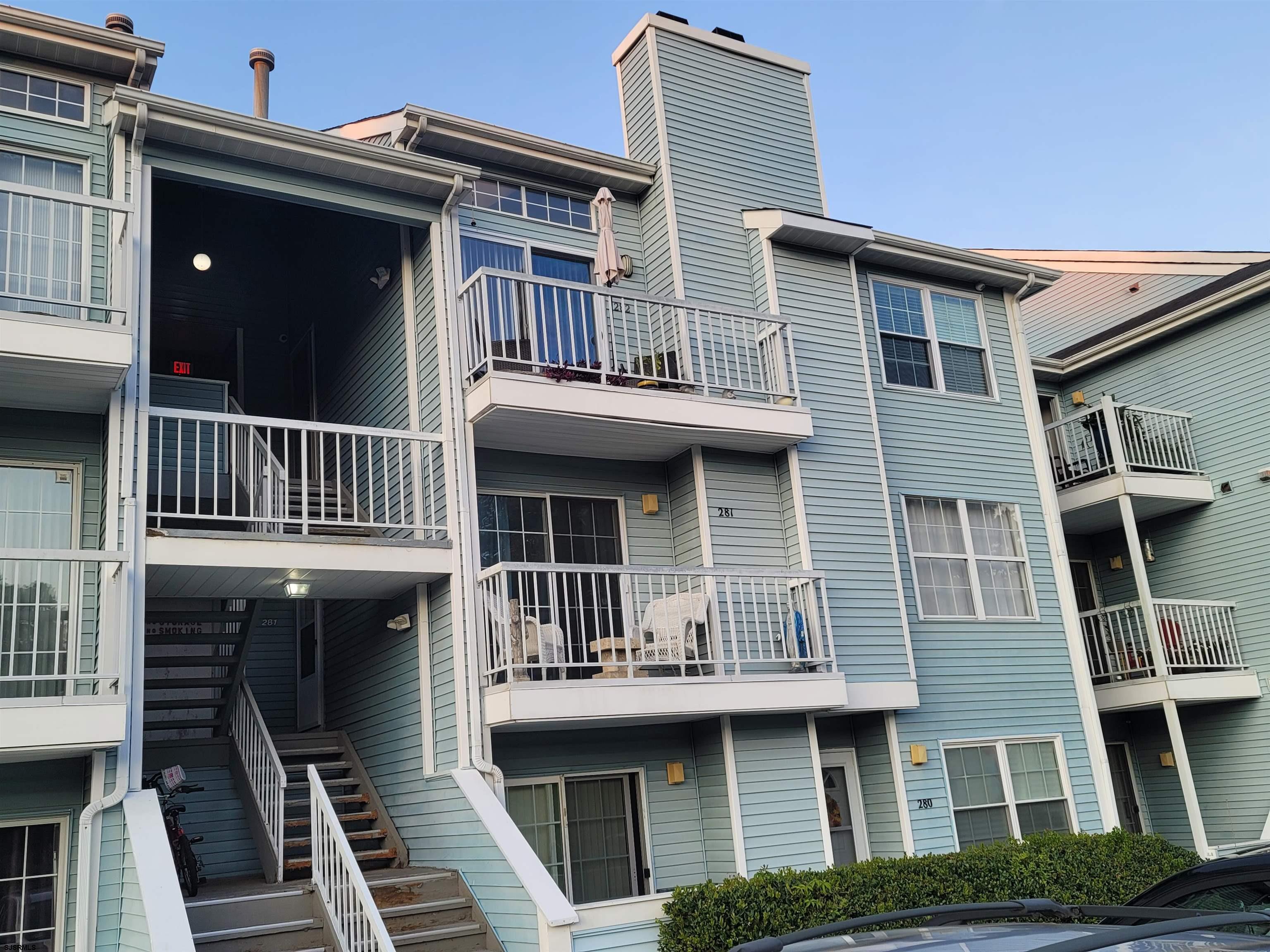 a front view of a house with a balcony