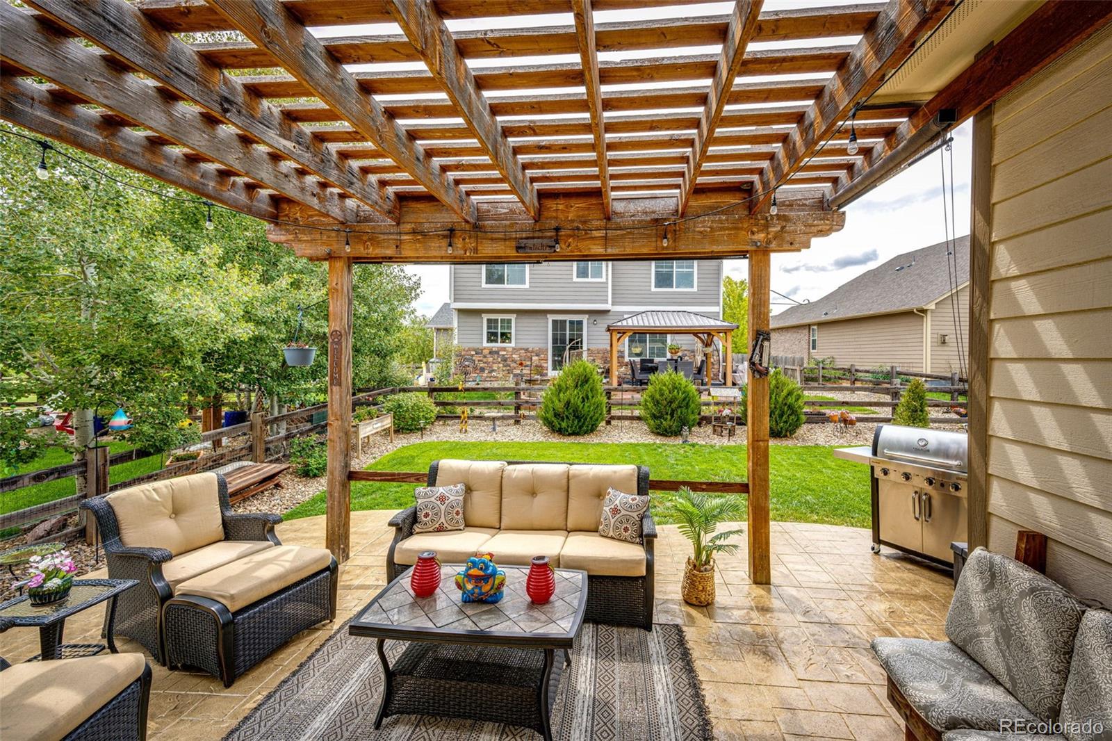 a outdoor living space with furniture and garden view