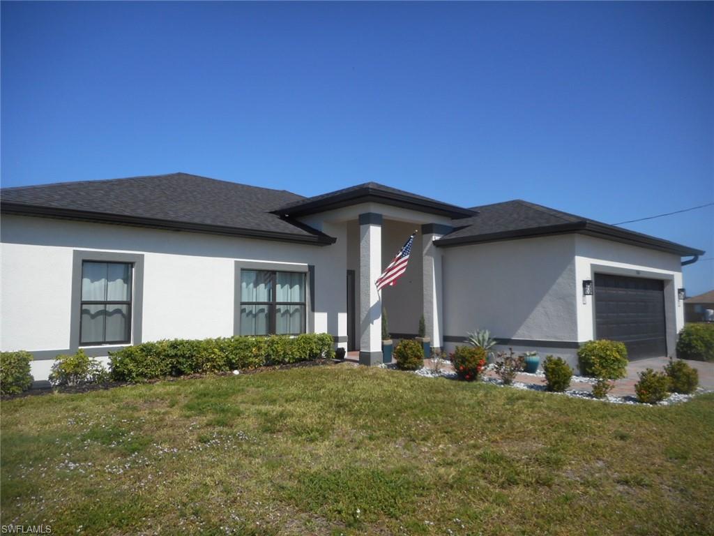 a front view of house with yard