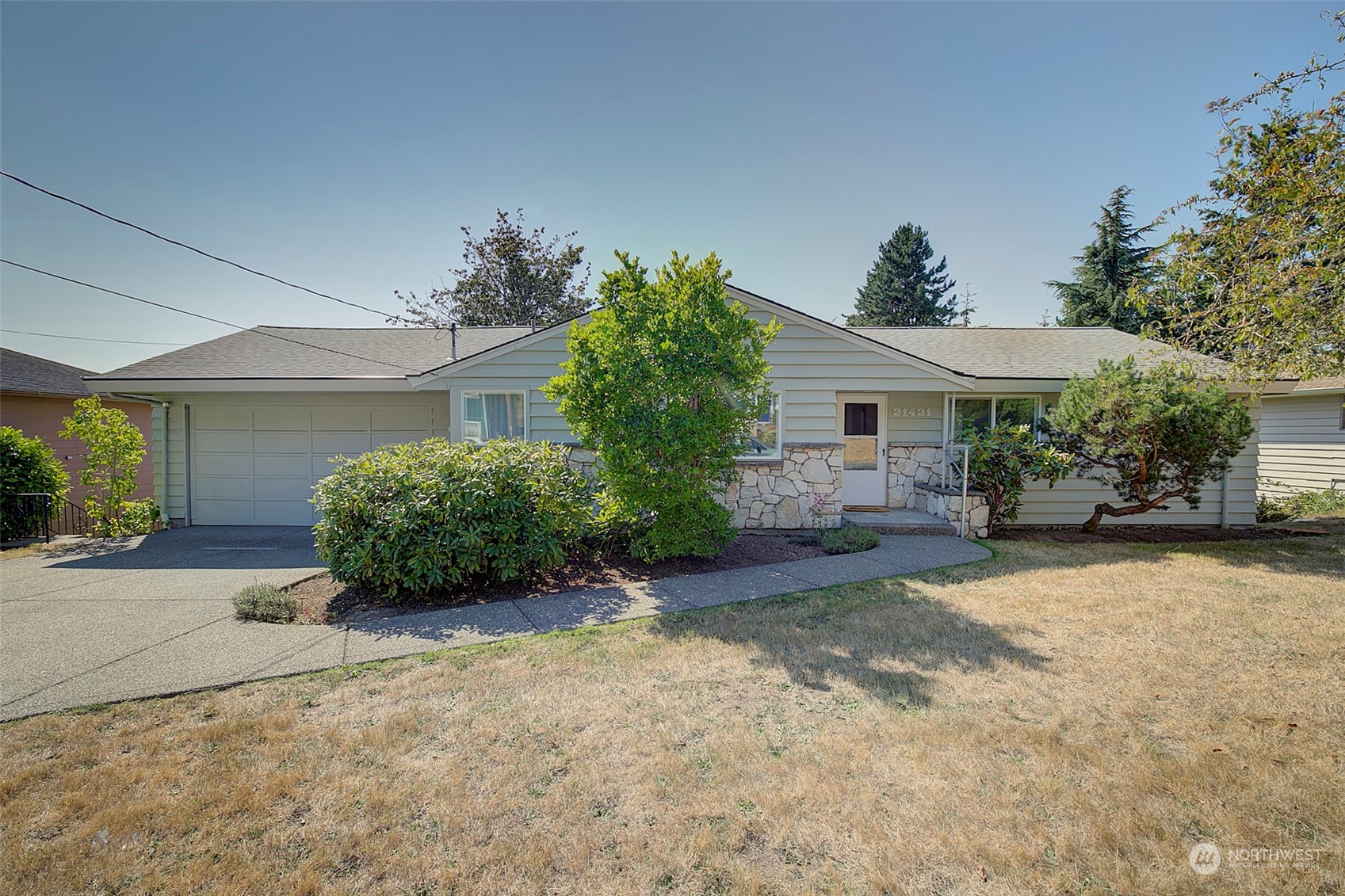 front view of a house with a small yard