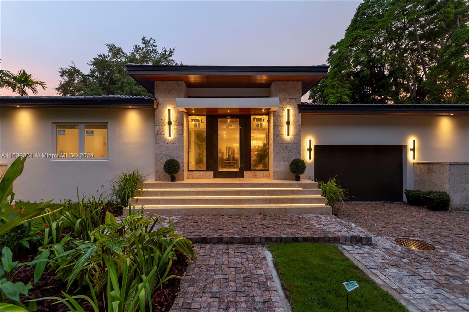 a house view with a garden space