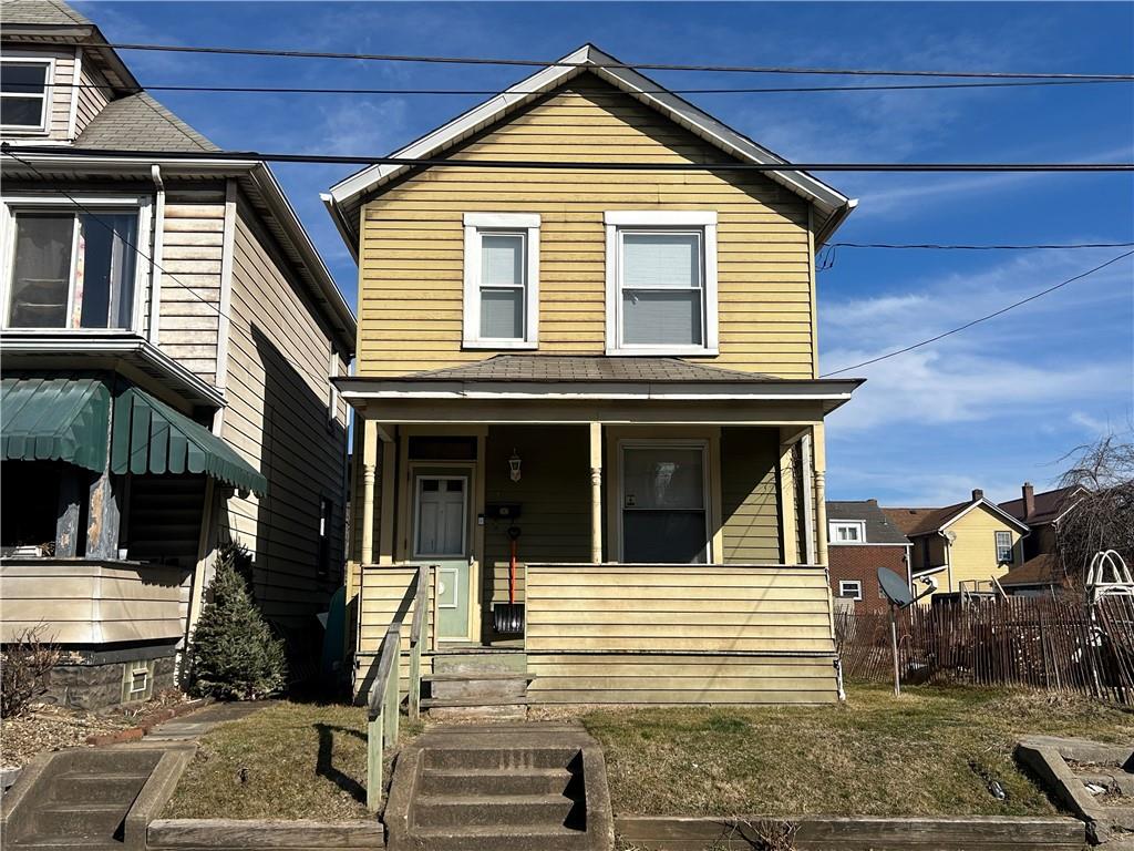 a view of a house with street