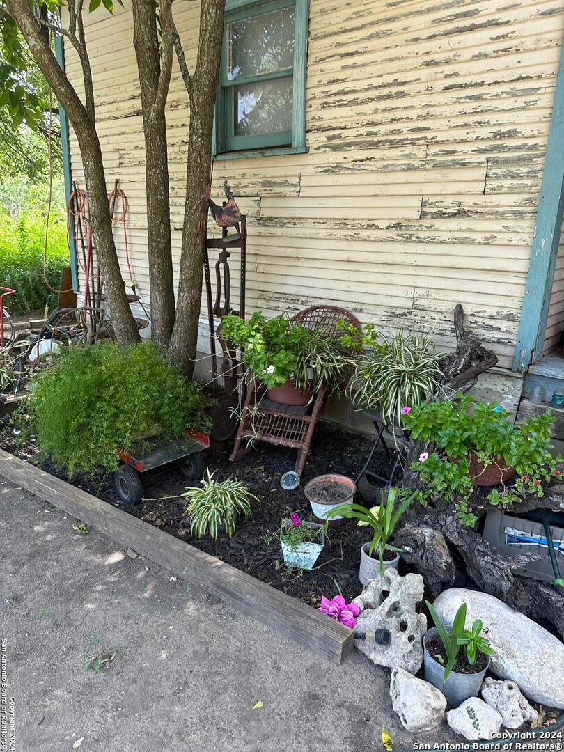 a backyard of a house with lots of green space