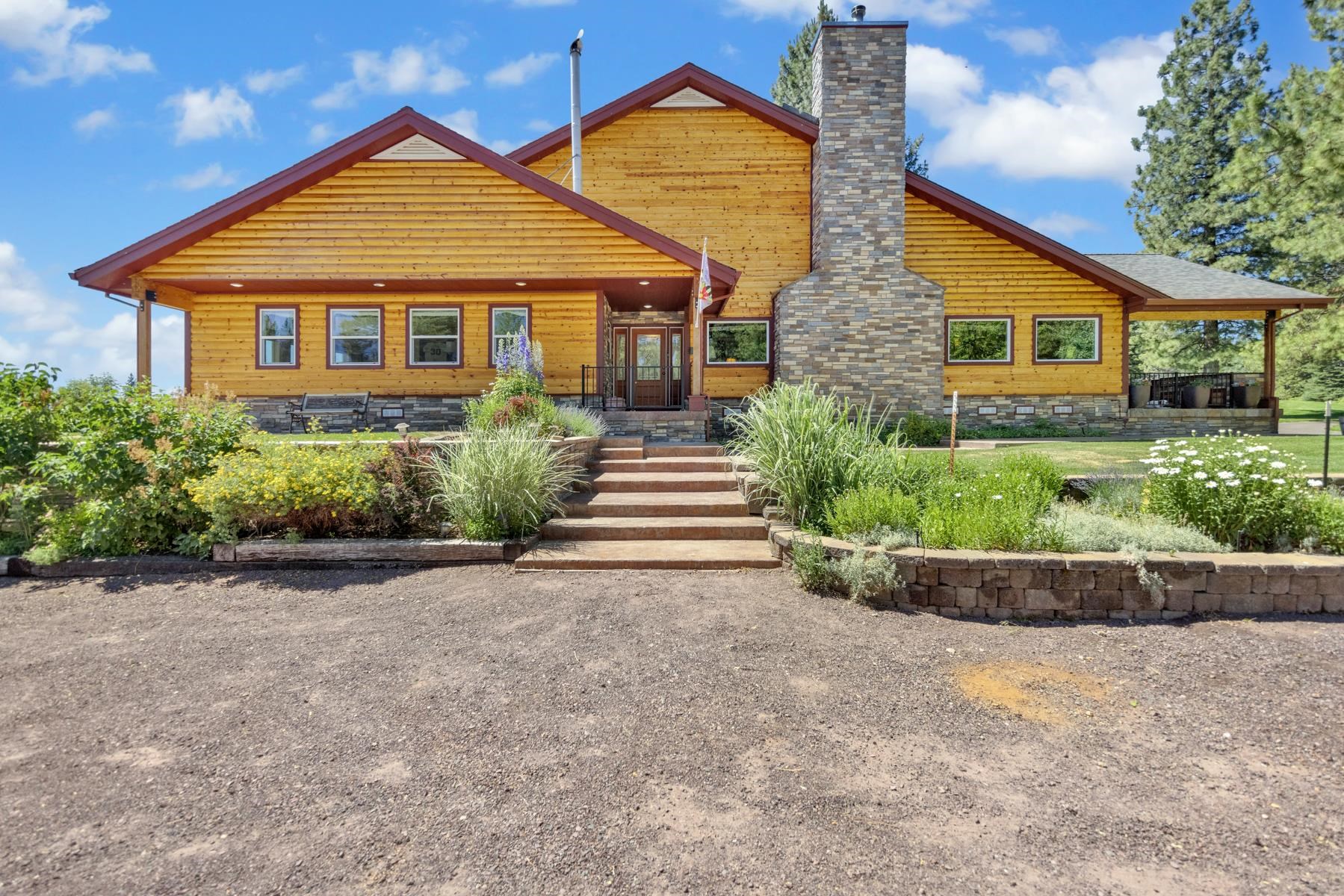 front view of a house and a yard