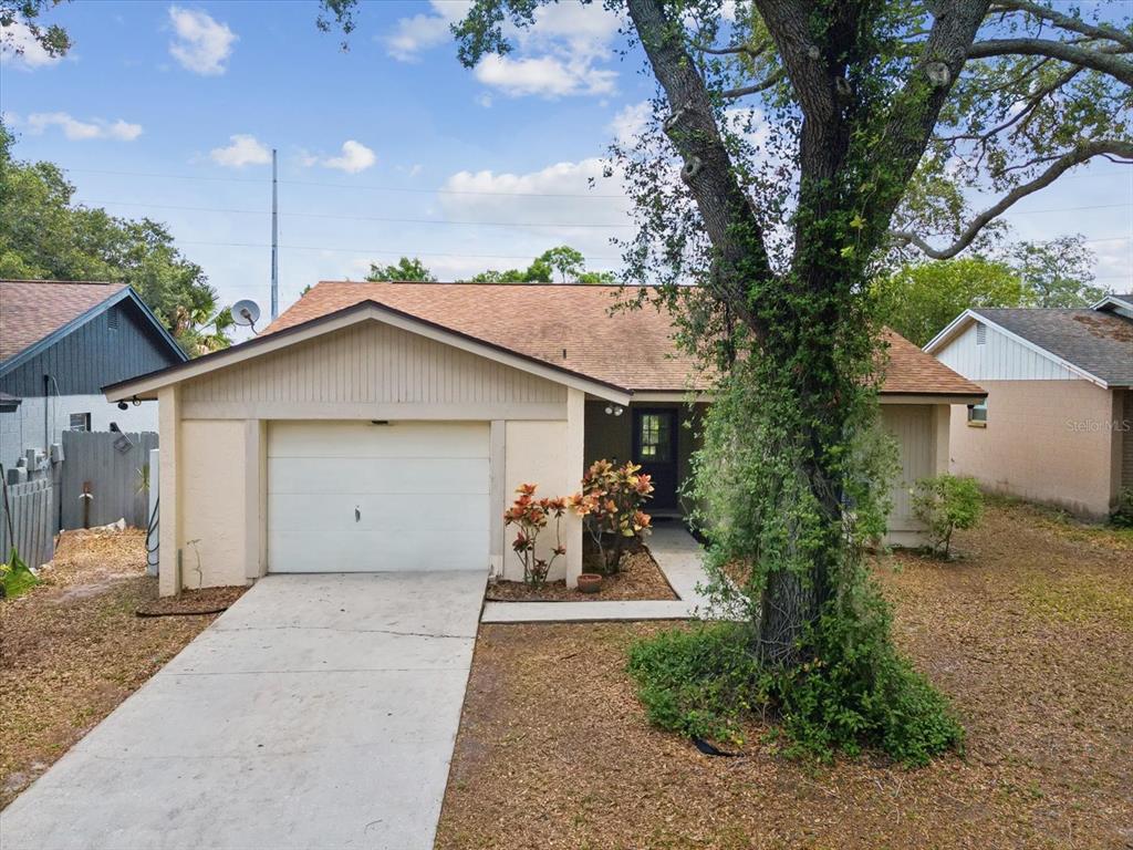 a view of a house with a yard