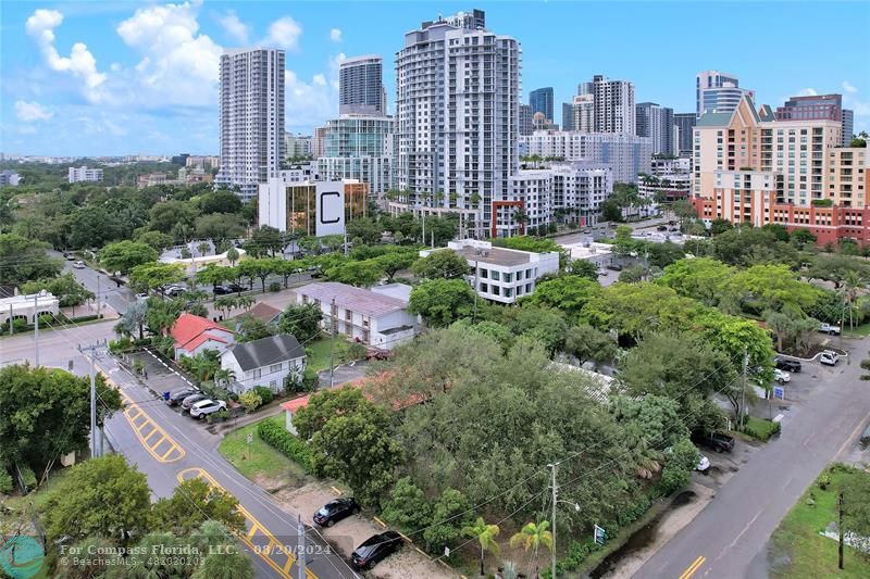 a view of a city with tall buildings