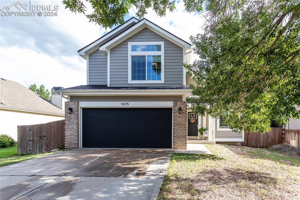 Front facade with a garage