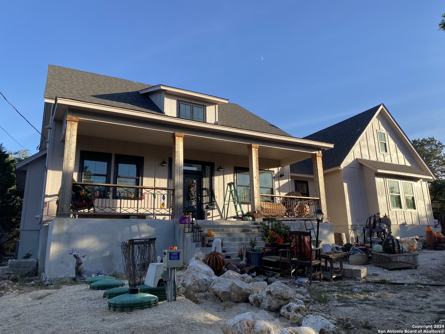 a front view of a house with patio