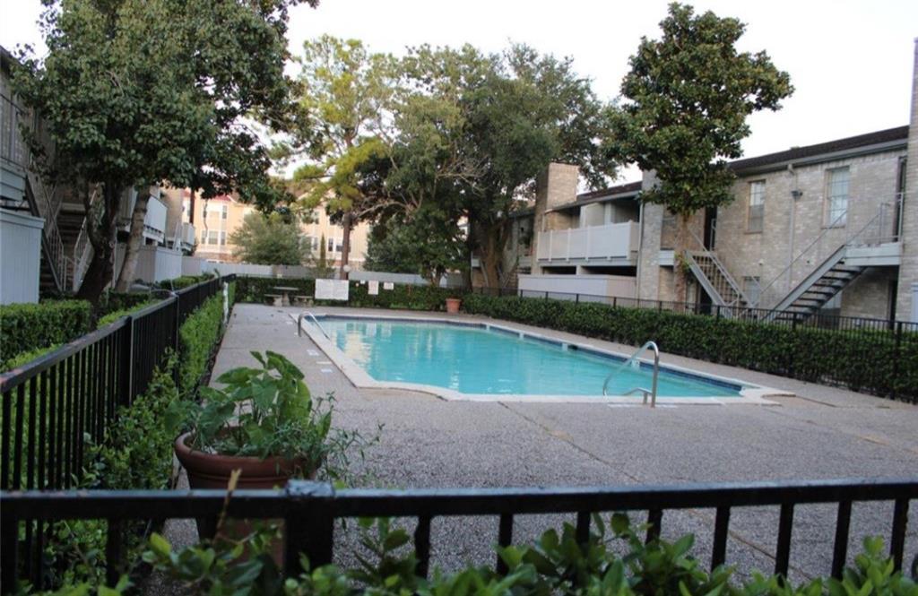 a view of swimming pool with a patio