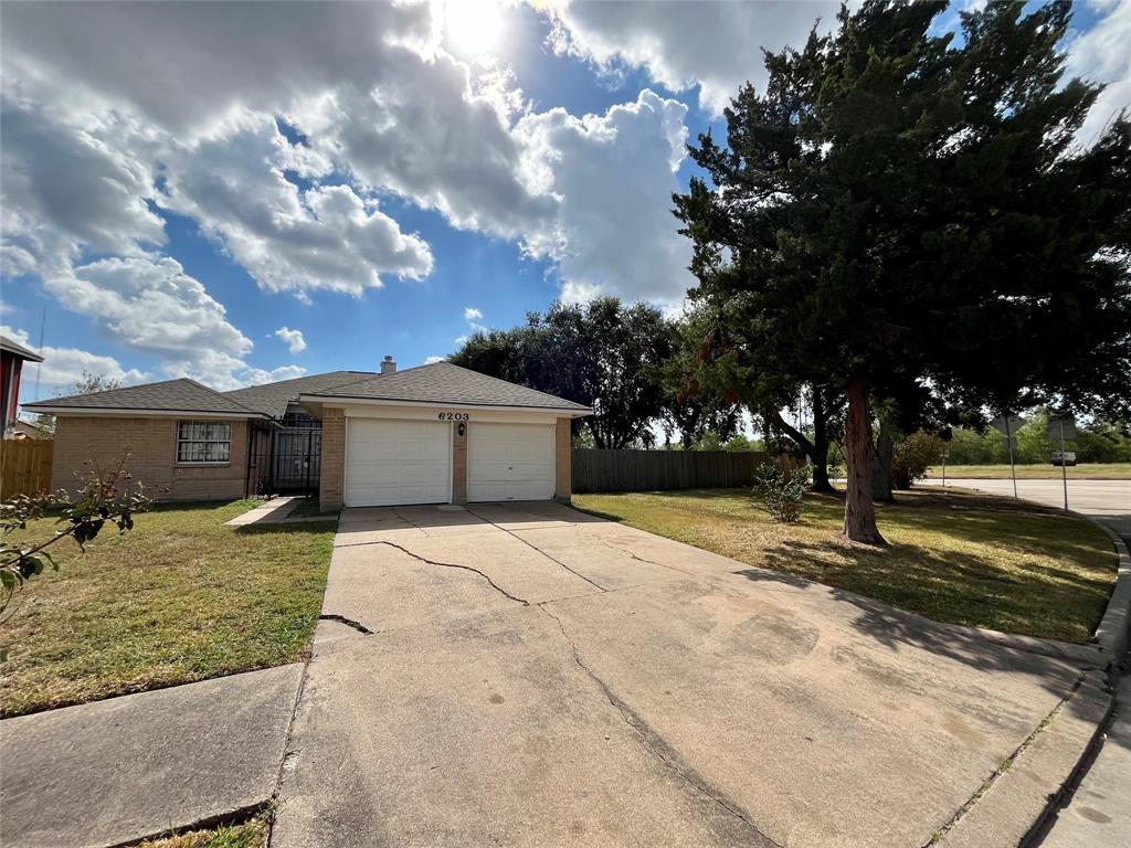 Corner Unit, large yard space, beautiful trees provide shade