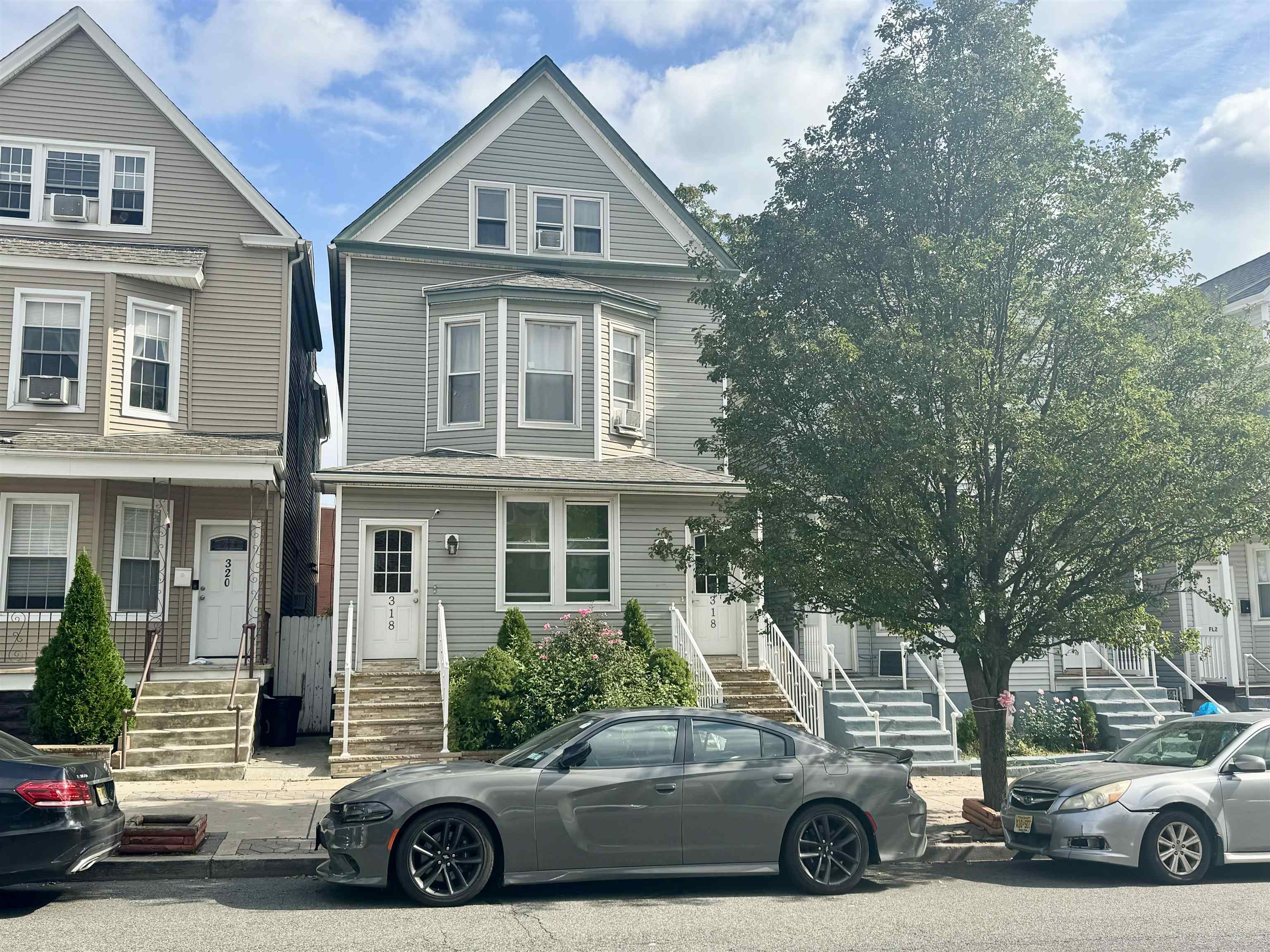 a car parked in front of a house