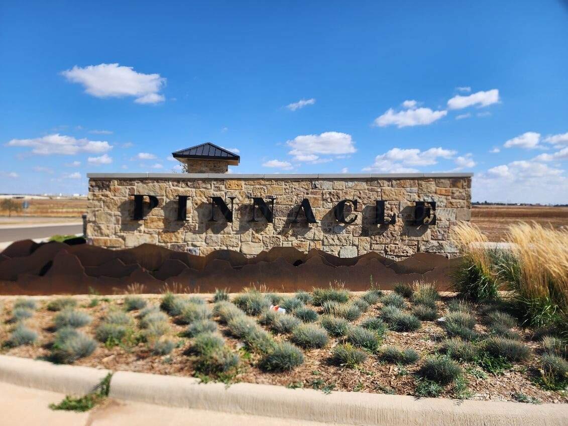 a view of a water with a terrace of the house