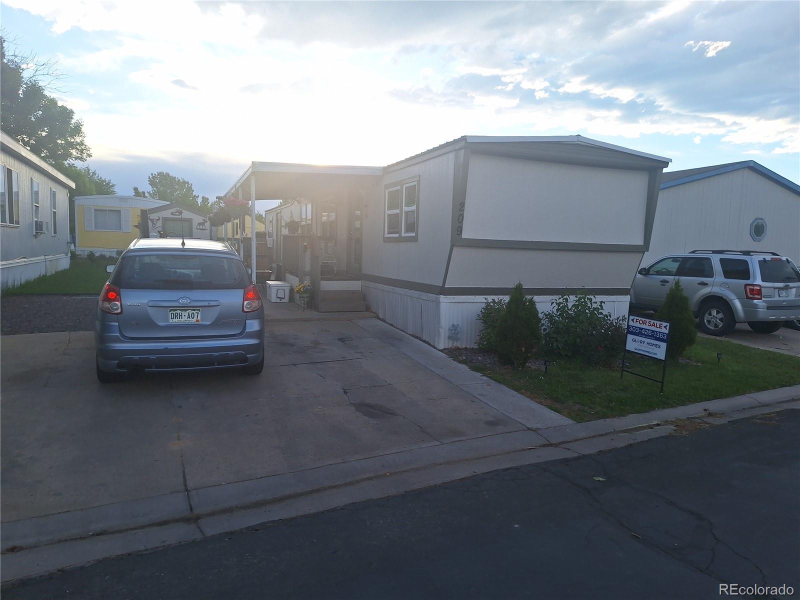 a car parked in front of a house