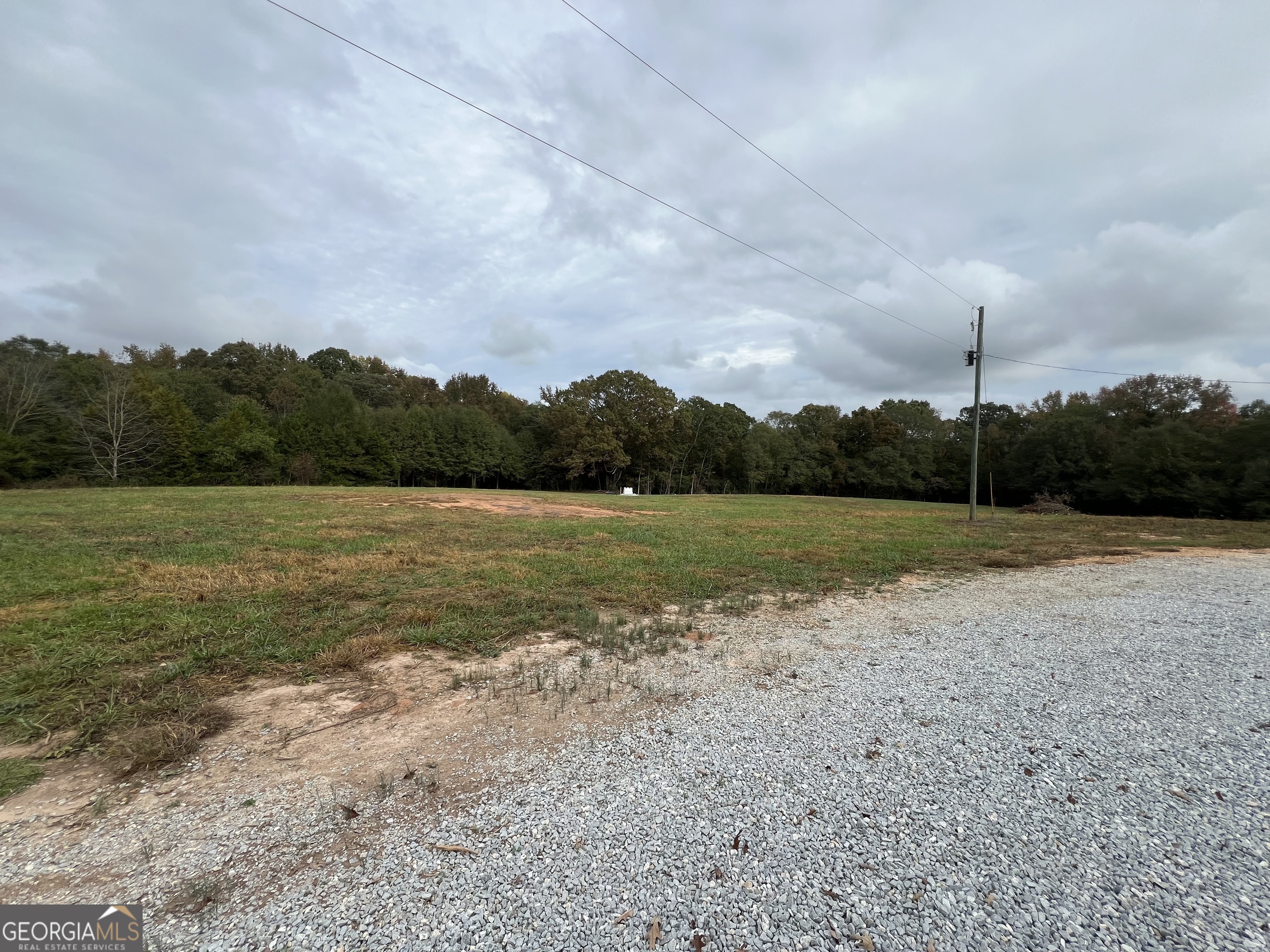 a view of a lake with a big yard