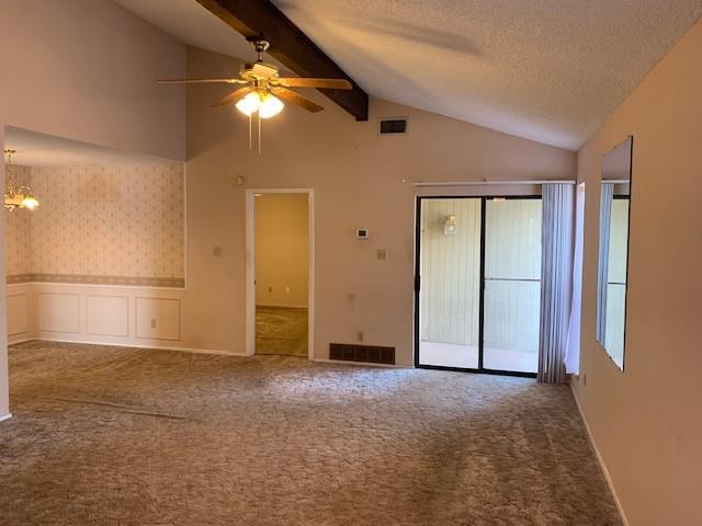 a view of empty room with a ceiling fan