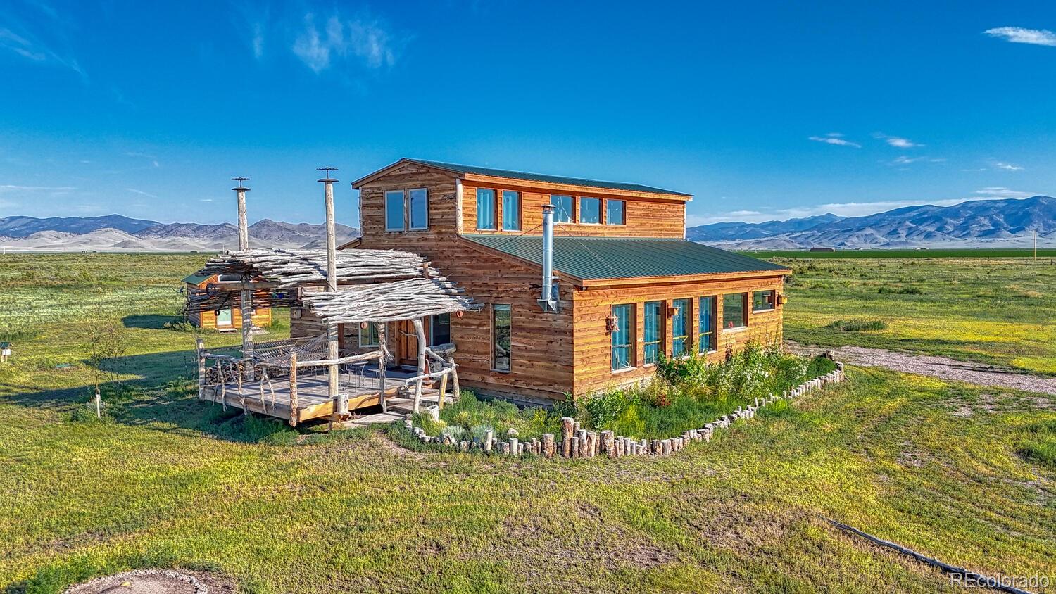 a view of a house with a ocean view